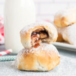 Peanut butter cup and jam wrapped in dough and air fried with a bite taken out.