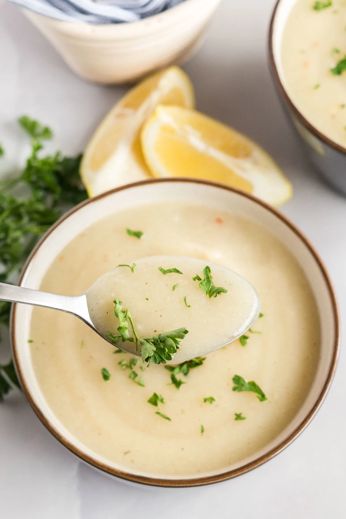 Spoonful of creamy cauliflower soup.
